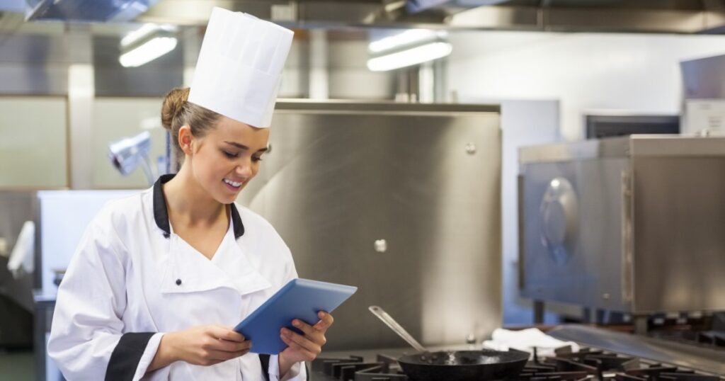 young chef using tablet