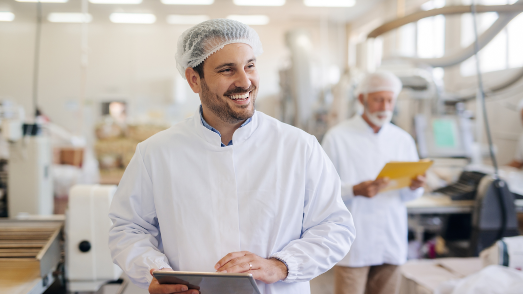 chef holding a tablet to manage inventory